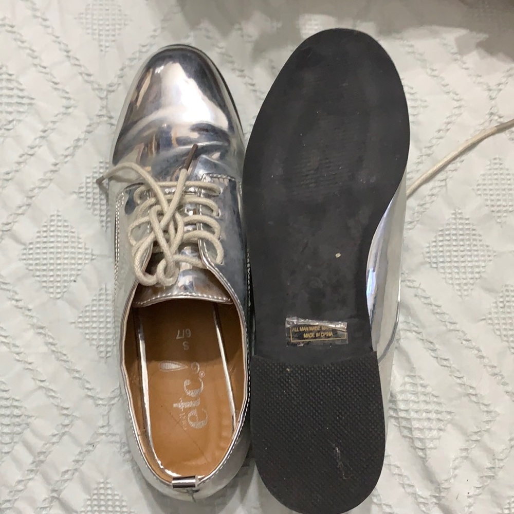 Shiny silver shoes. Rue21